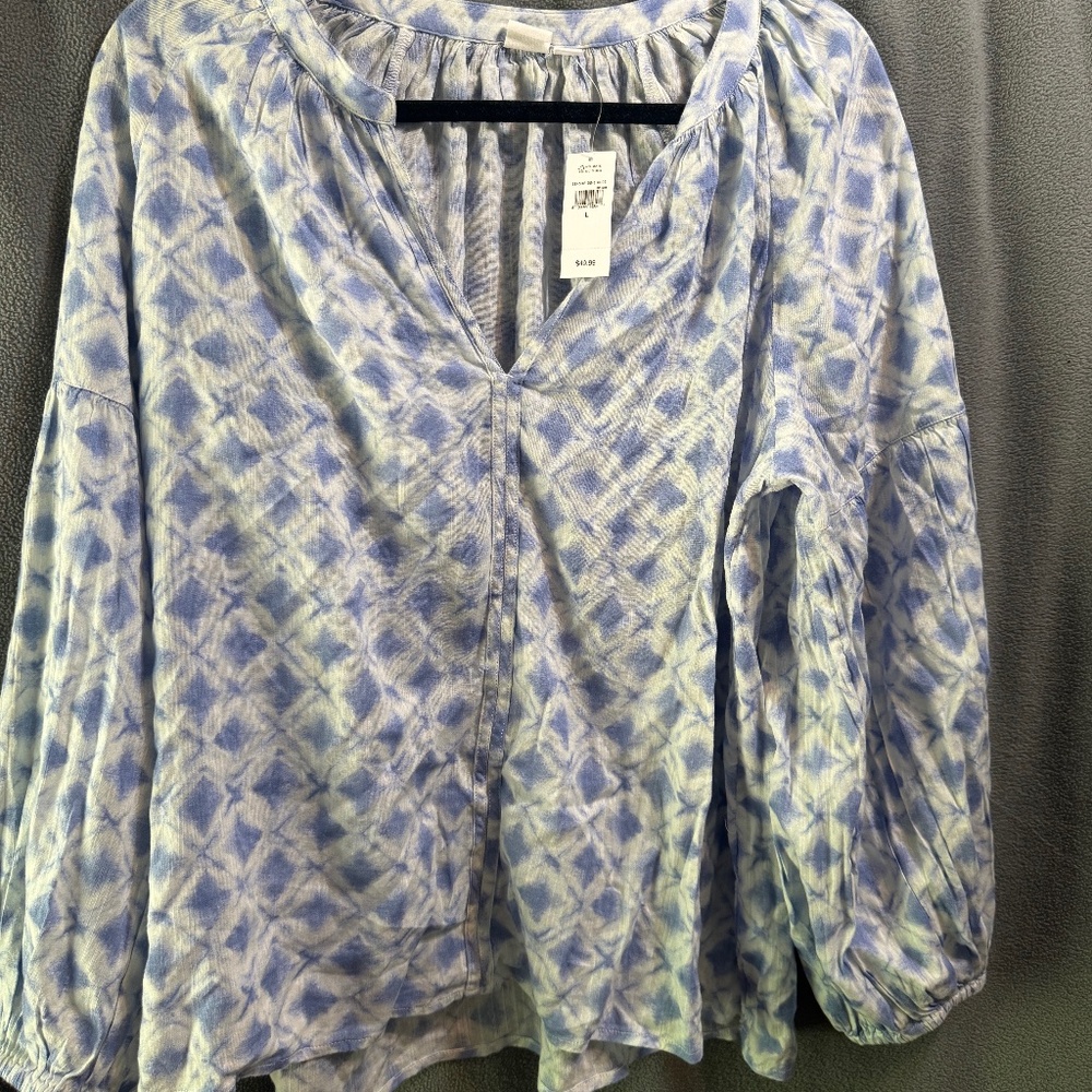 Flowing blue and white blouse